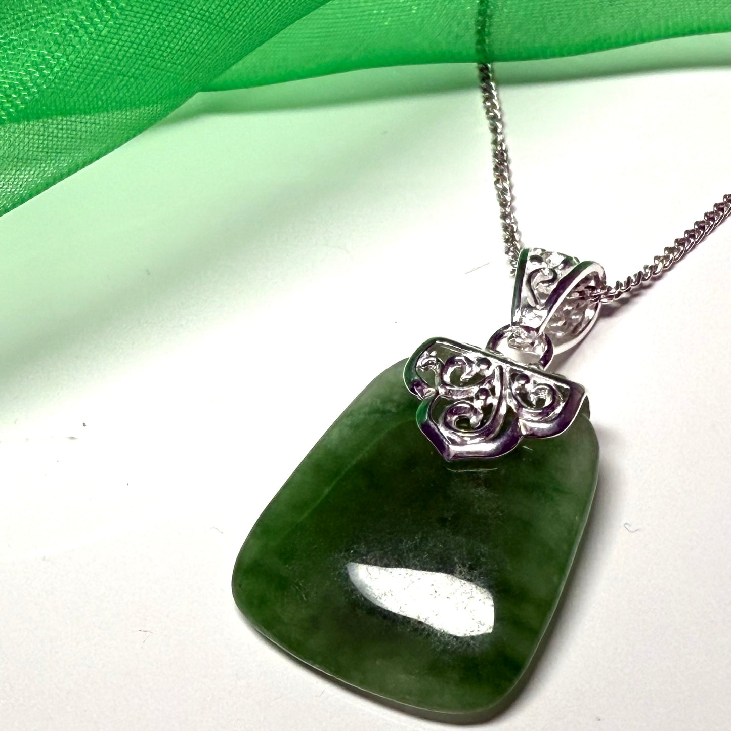 Real green jade necklace large cushion shaped with a solid silver curb chain included sterling silver with a chain