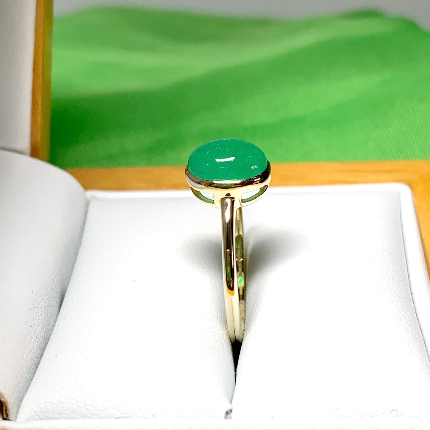 Real jade ring green oval yellow gold smooth rubbed over setting