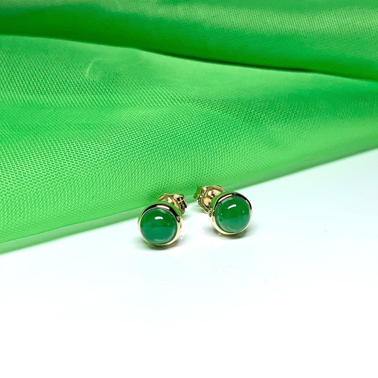 Real jade stud earrings green round rubbed over smooth setting yellow gold
