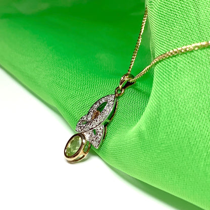 Peridot and diamond oval yellow gold necklace