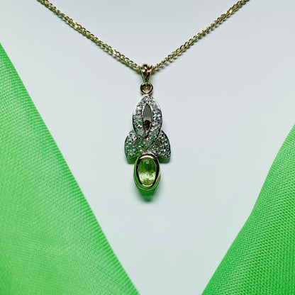 Peridot and diamond oval yellow gold necklace