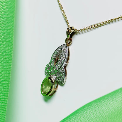 Peridot and diamond oval yellow gold necklace