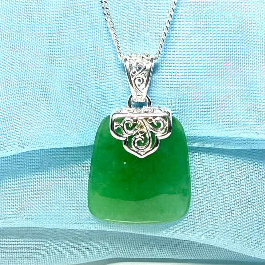 A stunning real jade necklace green sterling silver large cushion shaped, being a really gorgeous design