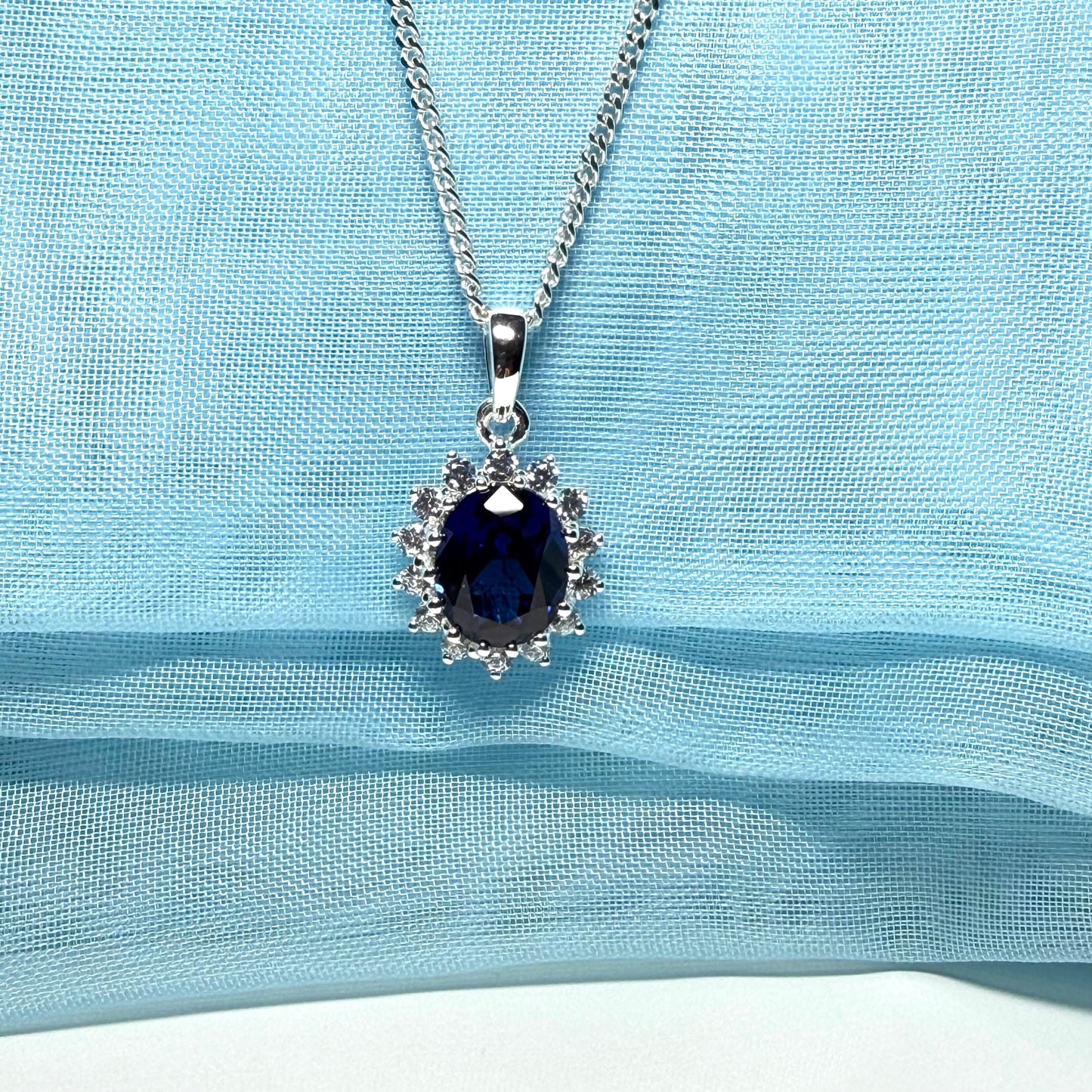Large necklace deep sapphire blue white cubic zirconia oval cluster
