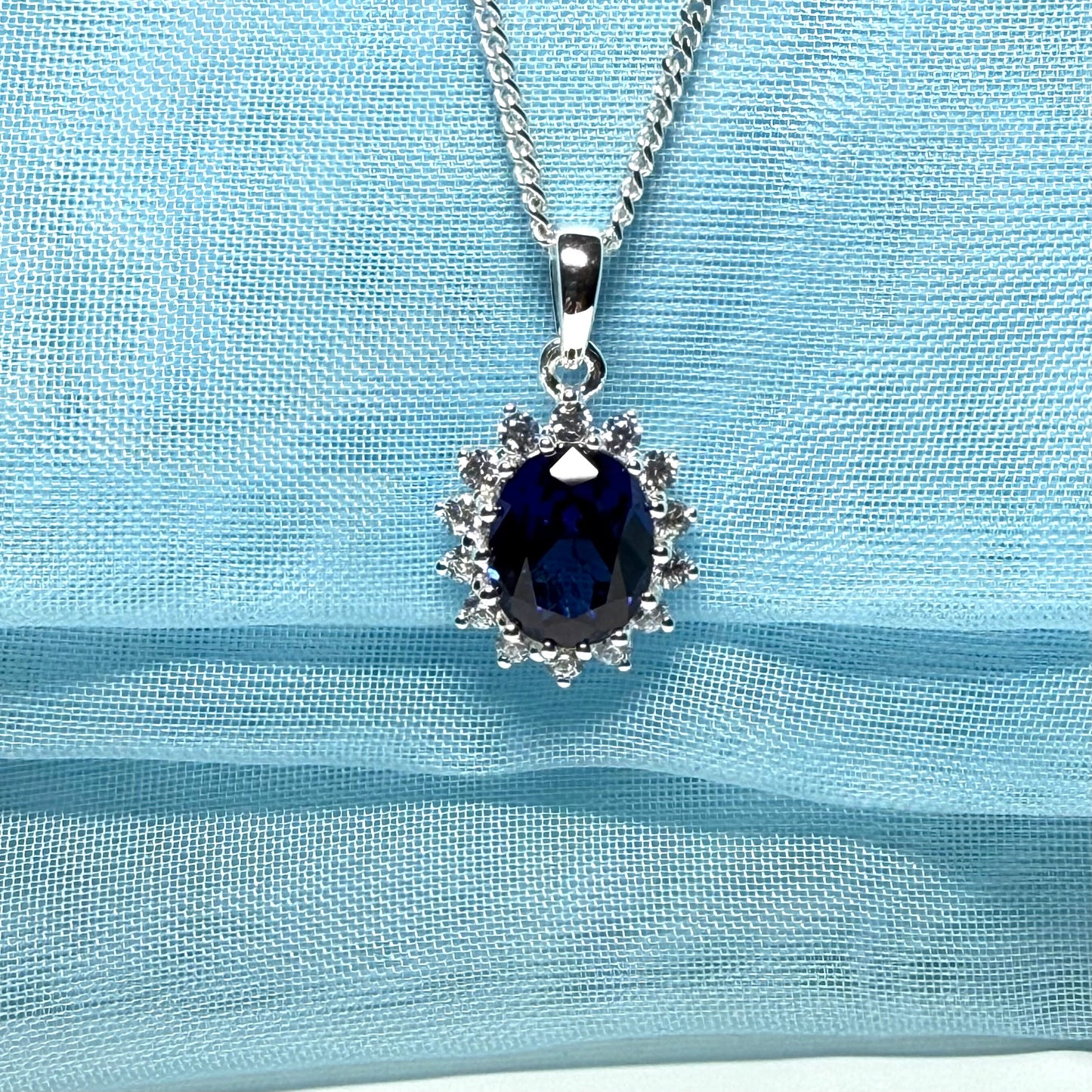 Large necklace deep sapphire blue white cubic zirconia oval cluster