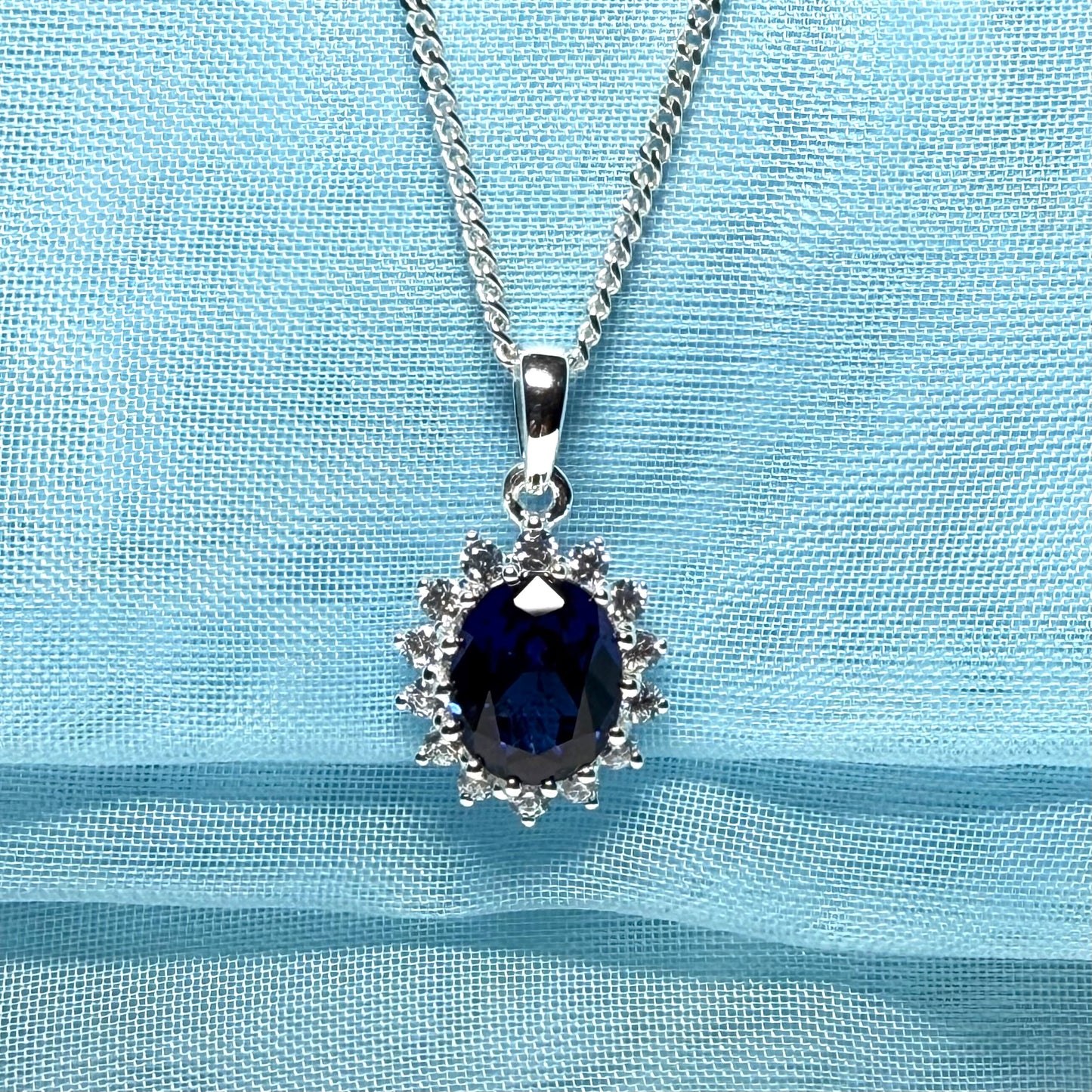 Large necklace deep sapphire blue white cubic zirconia oval cluster