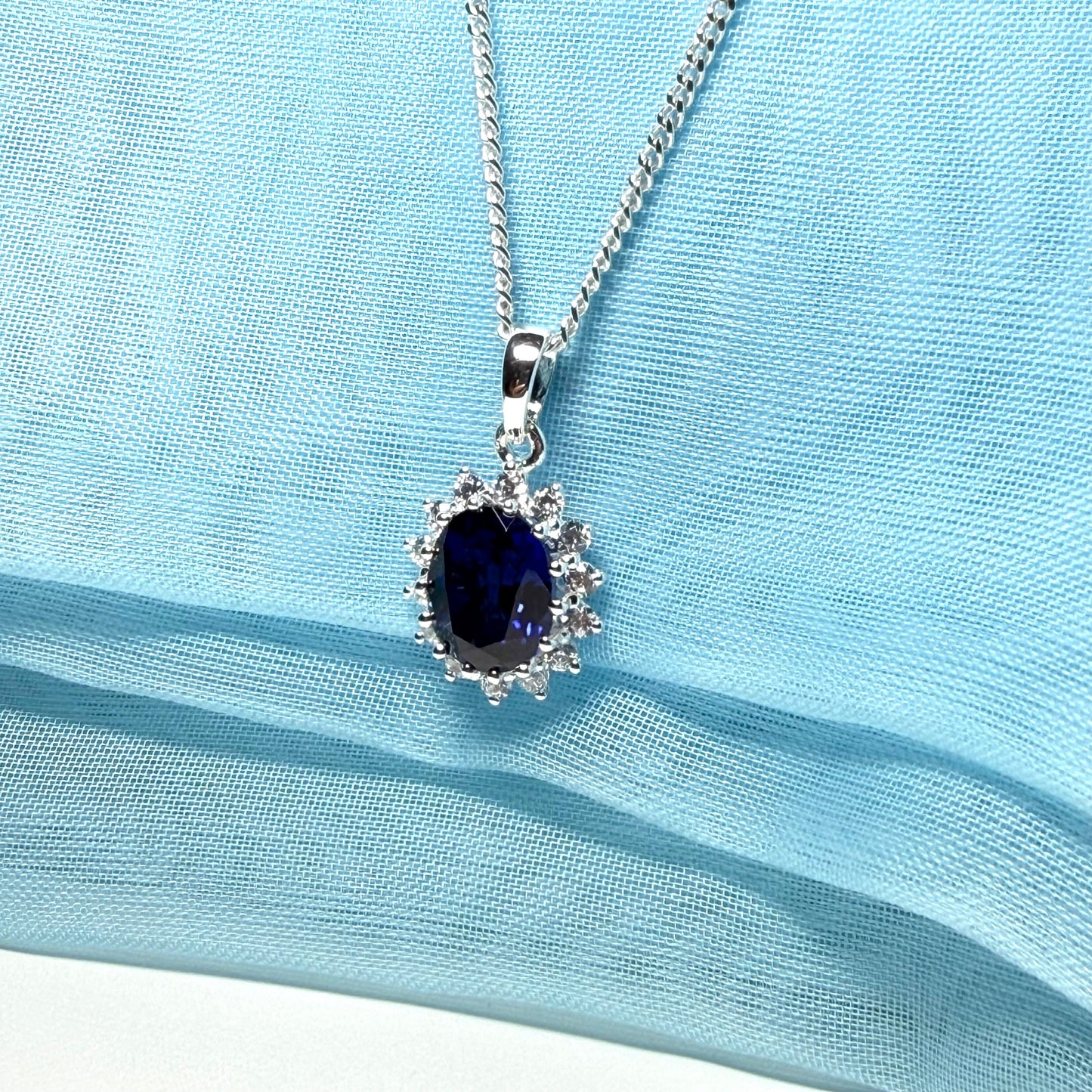 Large necklace deep sapphire blue white cubic zirconia oval cluster