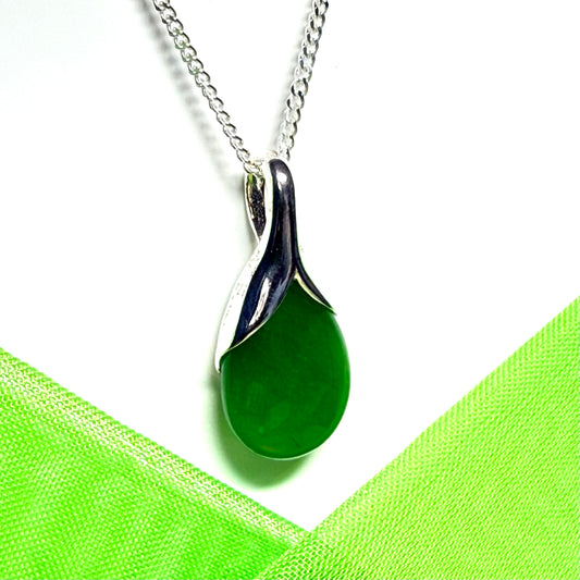 A real green jade pendant teardrop with a pear shaped necklace, with chain included