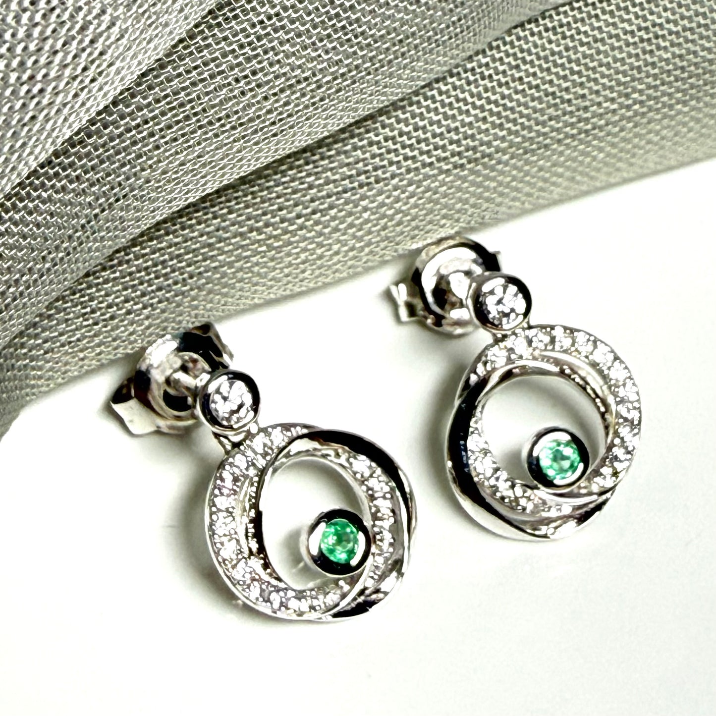 Real green emerald and cubic zirconia round swirl stud earrings