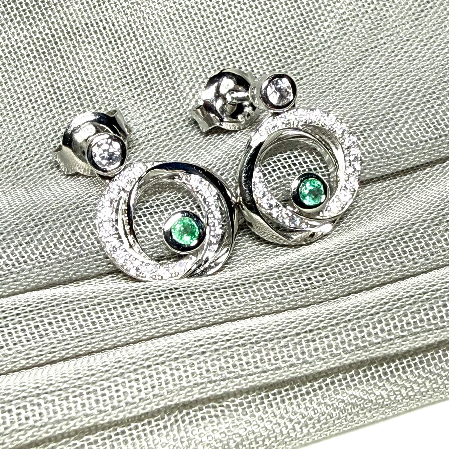 Real green emerald and cubic zirconia round swirl stud earrings
