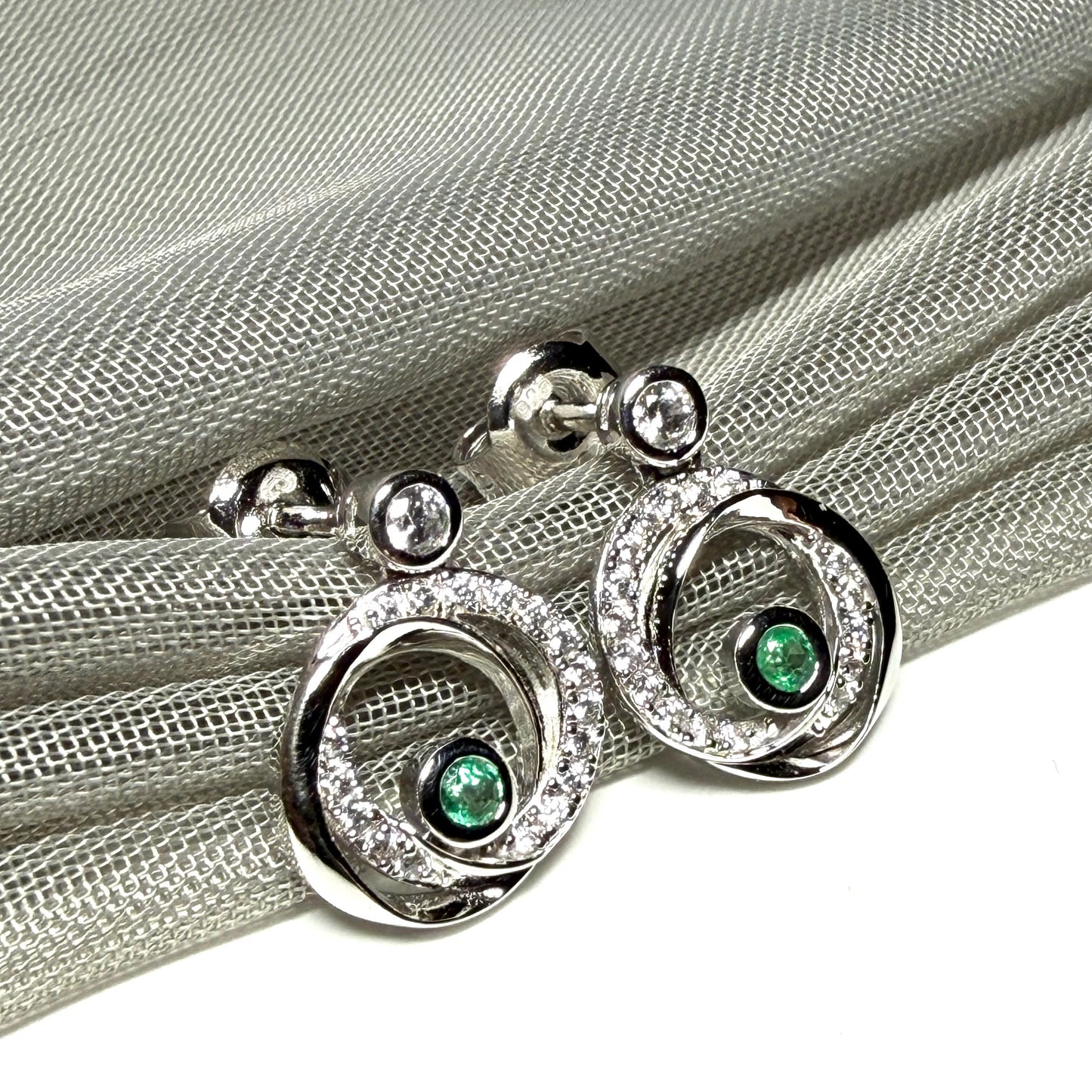 Real green emerald and cubic zirconia round swirl stud earrings