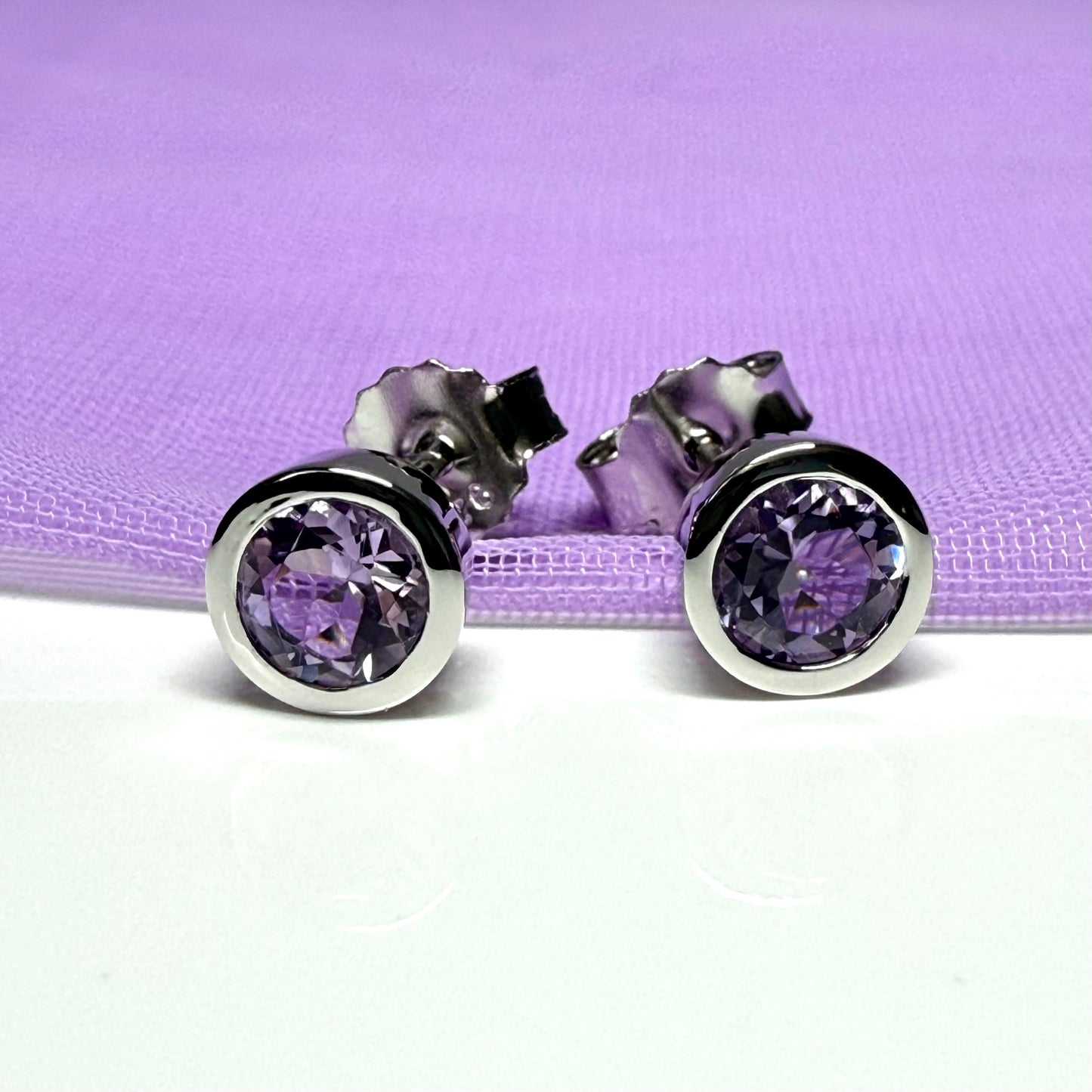 Real purple round amethyst stud earrings smooth rubbed over edges