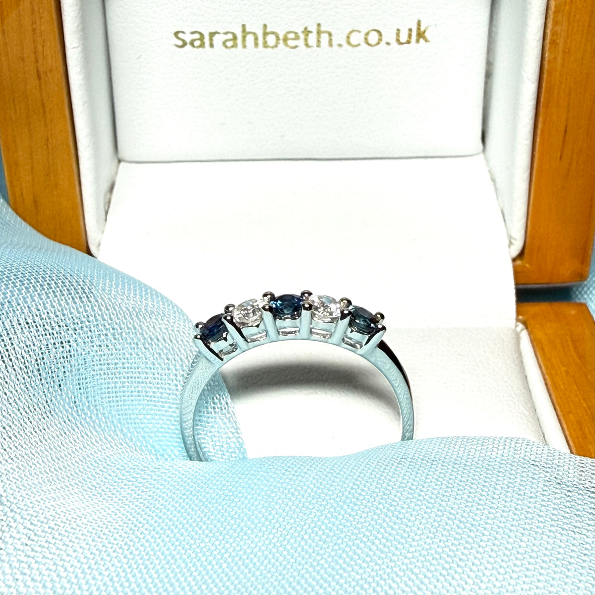 Blue Sapphire And Diamond Claw Set Eternity Ring White Gold