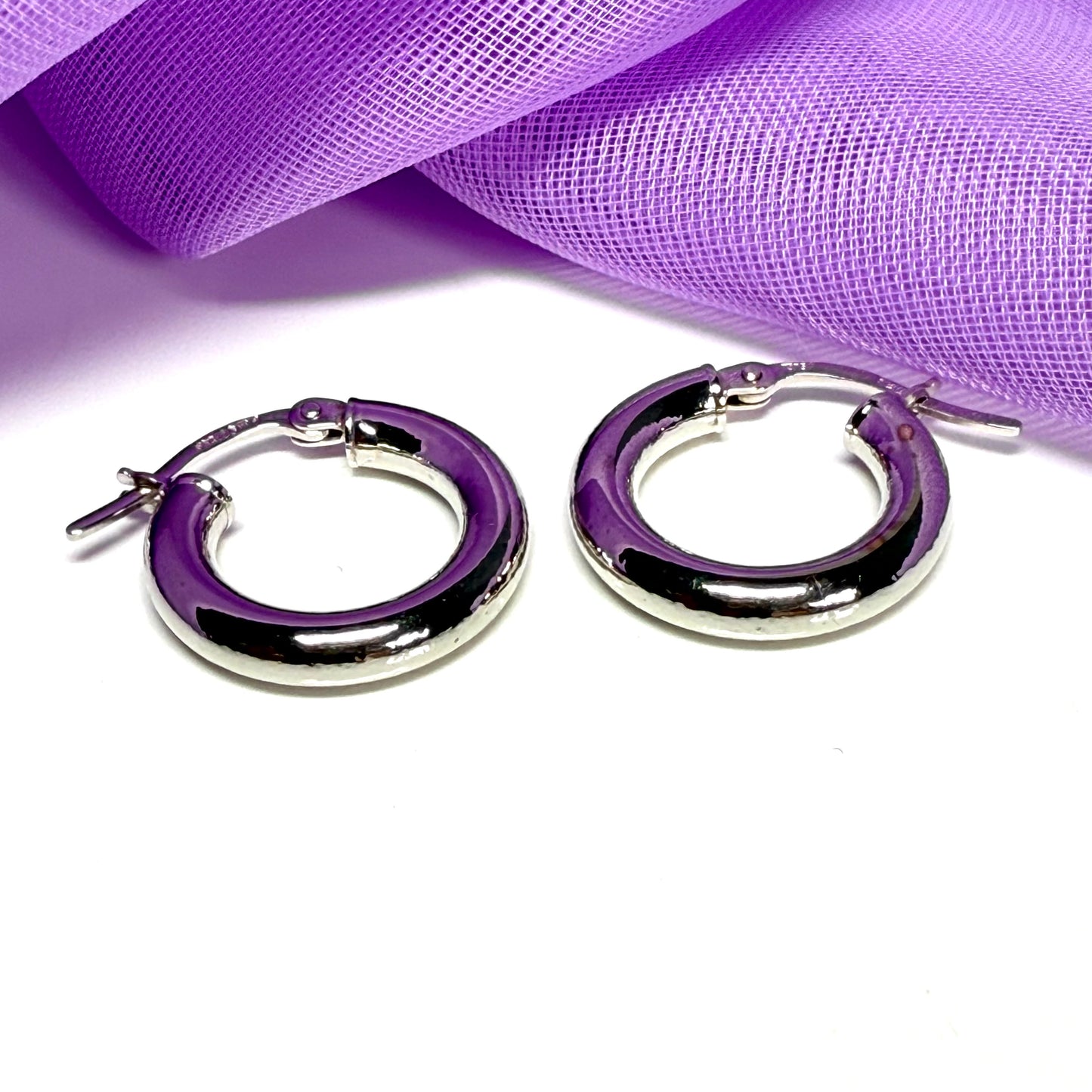 Plain highly polished white gold hoop earrings 16 mm