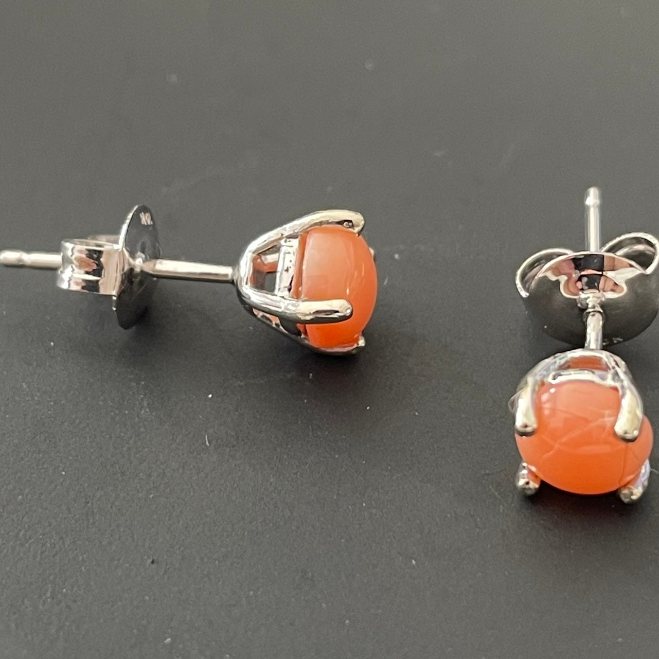 Real coral white gold round claw set stud earrings