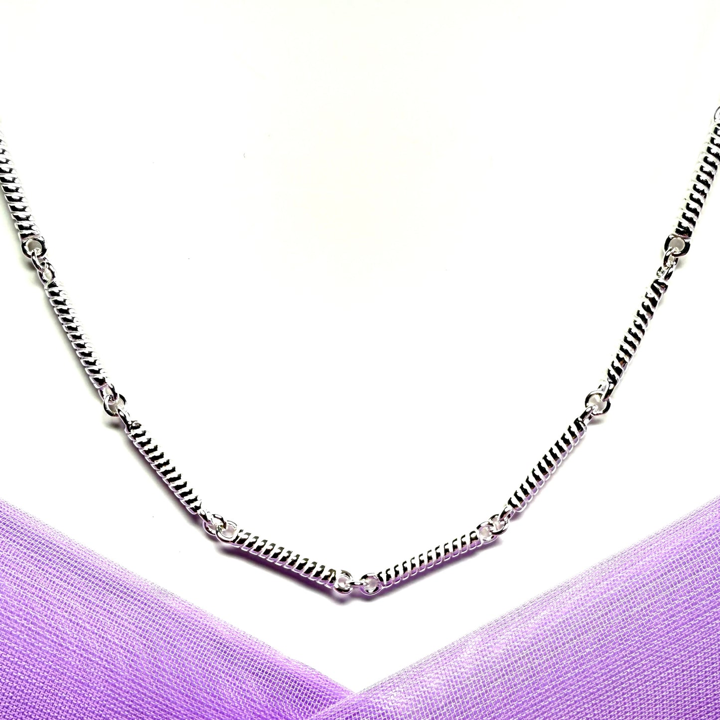 Ladies sterling silver long scrolled twisted patterned necklace solid links