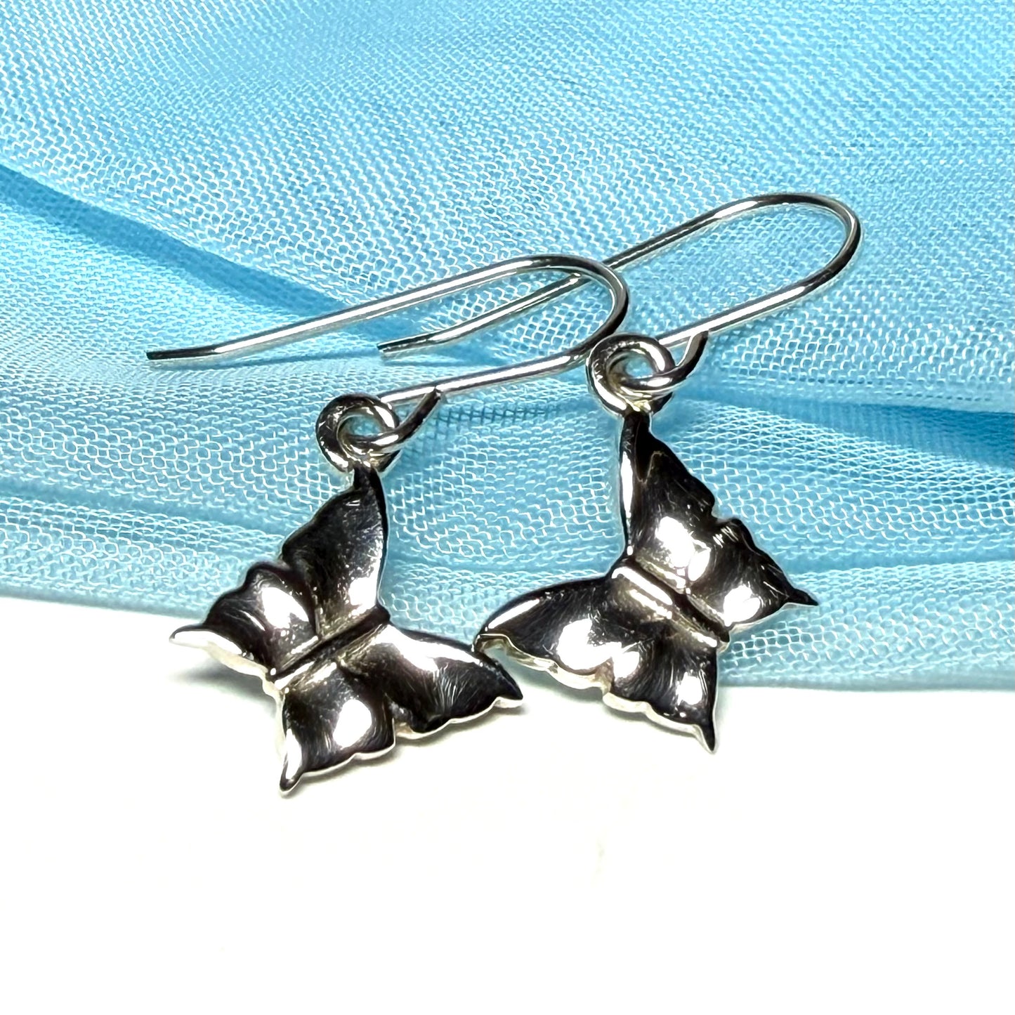 Ladies butterfly shaped drop earrings sterling silver