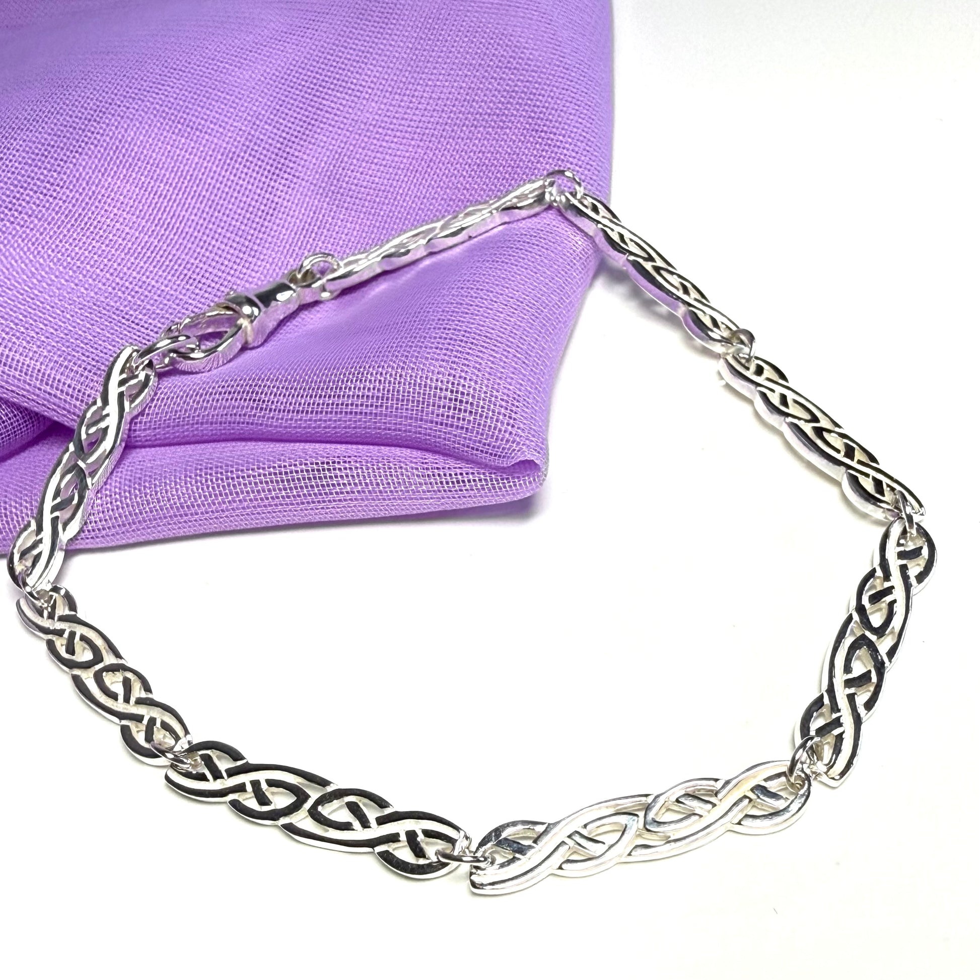 Ladies sterling silver bracelet fancy patterned solid patterned Celtic link