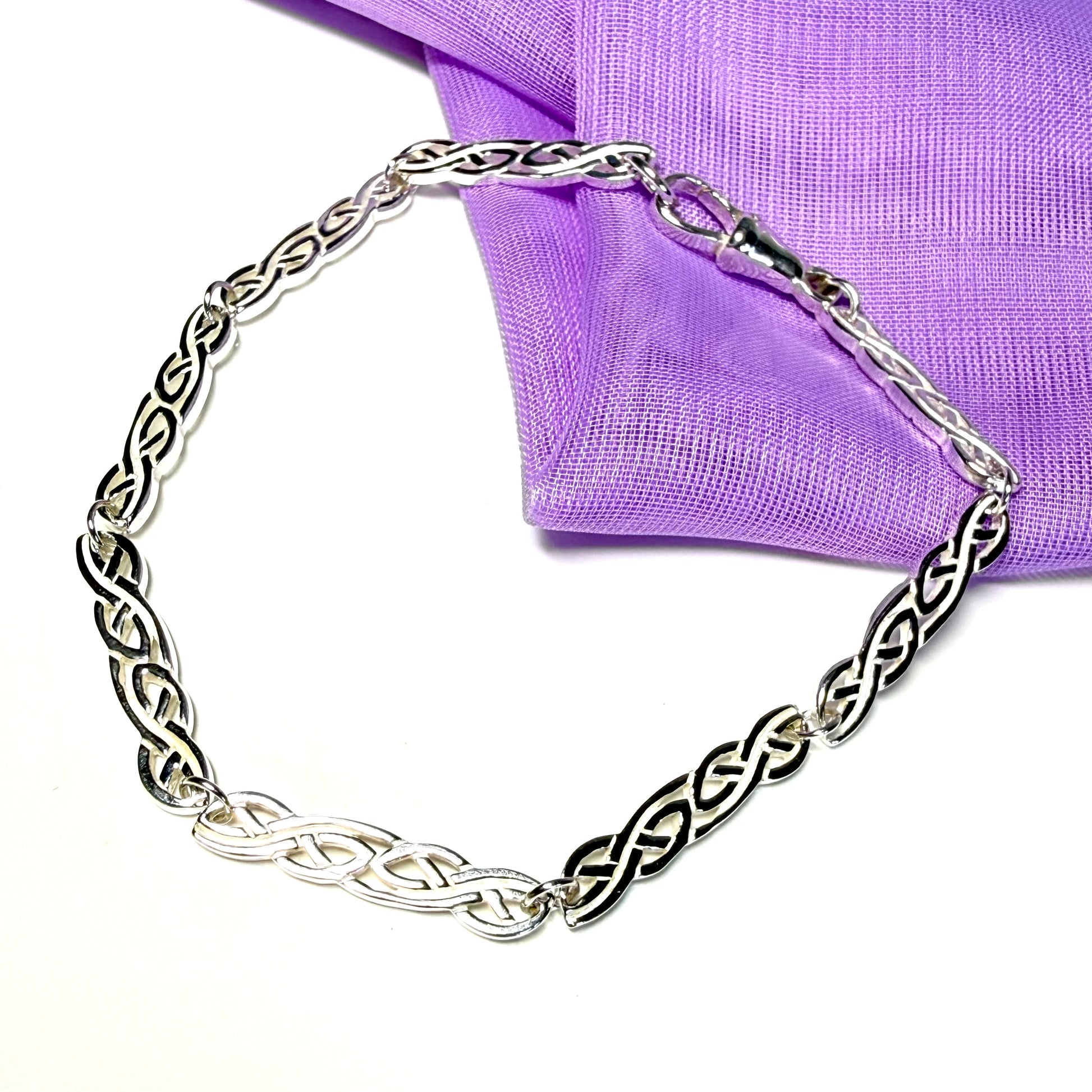 Ladies sterling silver bracelet fancy patterned solid patterned Celtic link