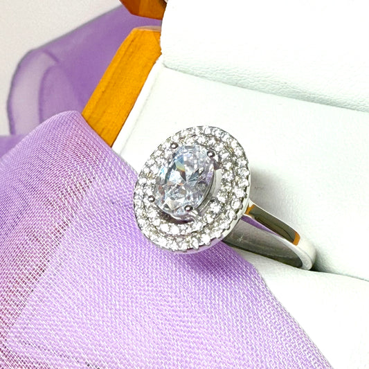 Ladies sterling silver oval shaped halo cluster ring