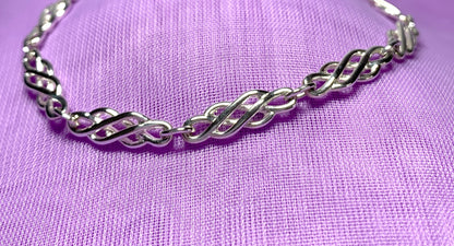 Ladies sterling silver bracelet fancy patterned solid Celtic link