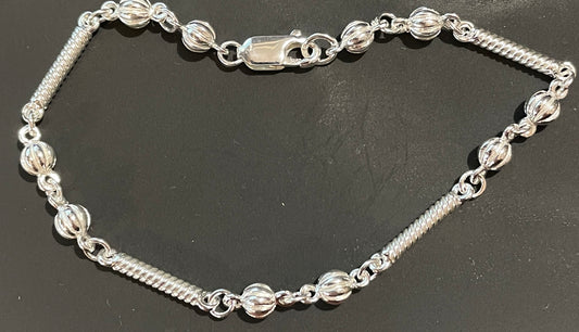 Ladies sterling silver long patterned bobble bracelet solid link