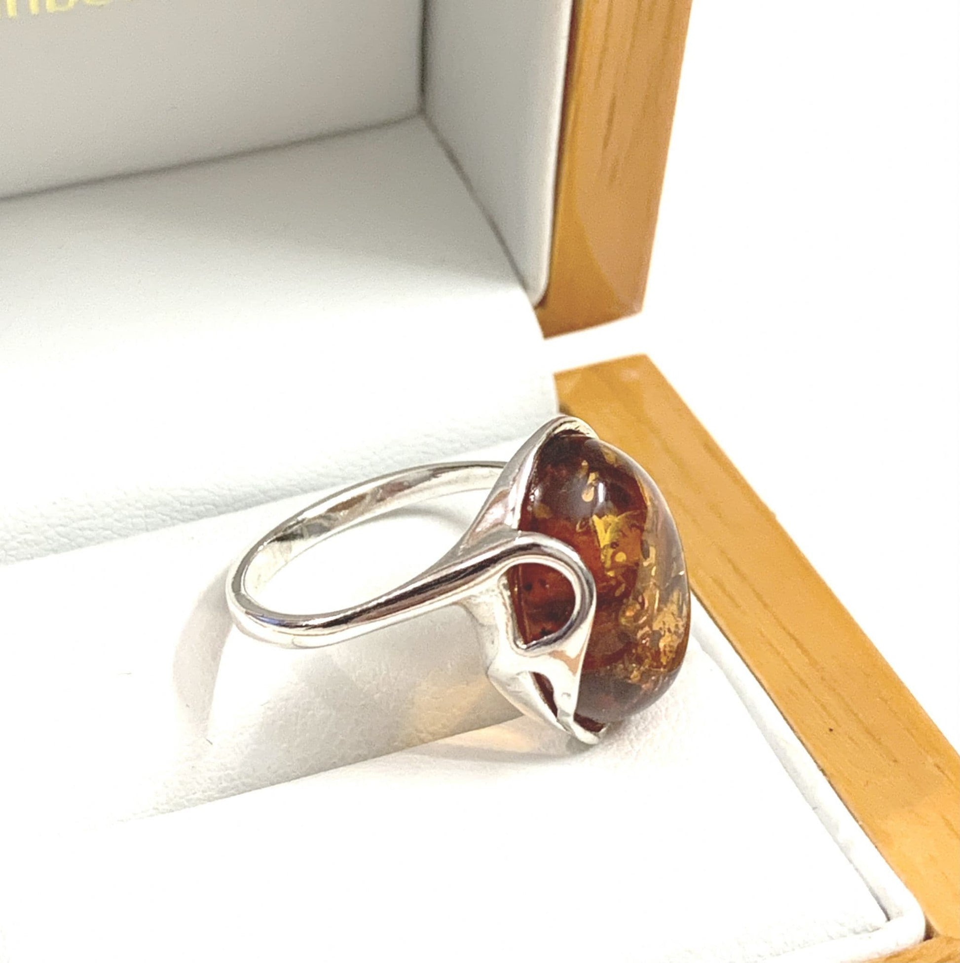 Large Oval Twisted Sterling Silver Orange Amber Ring