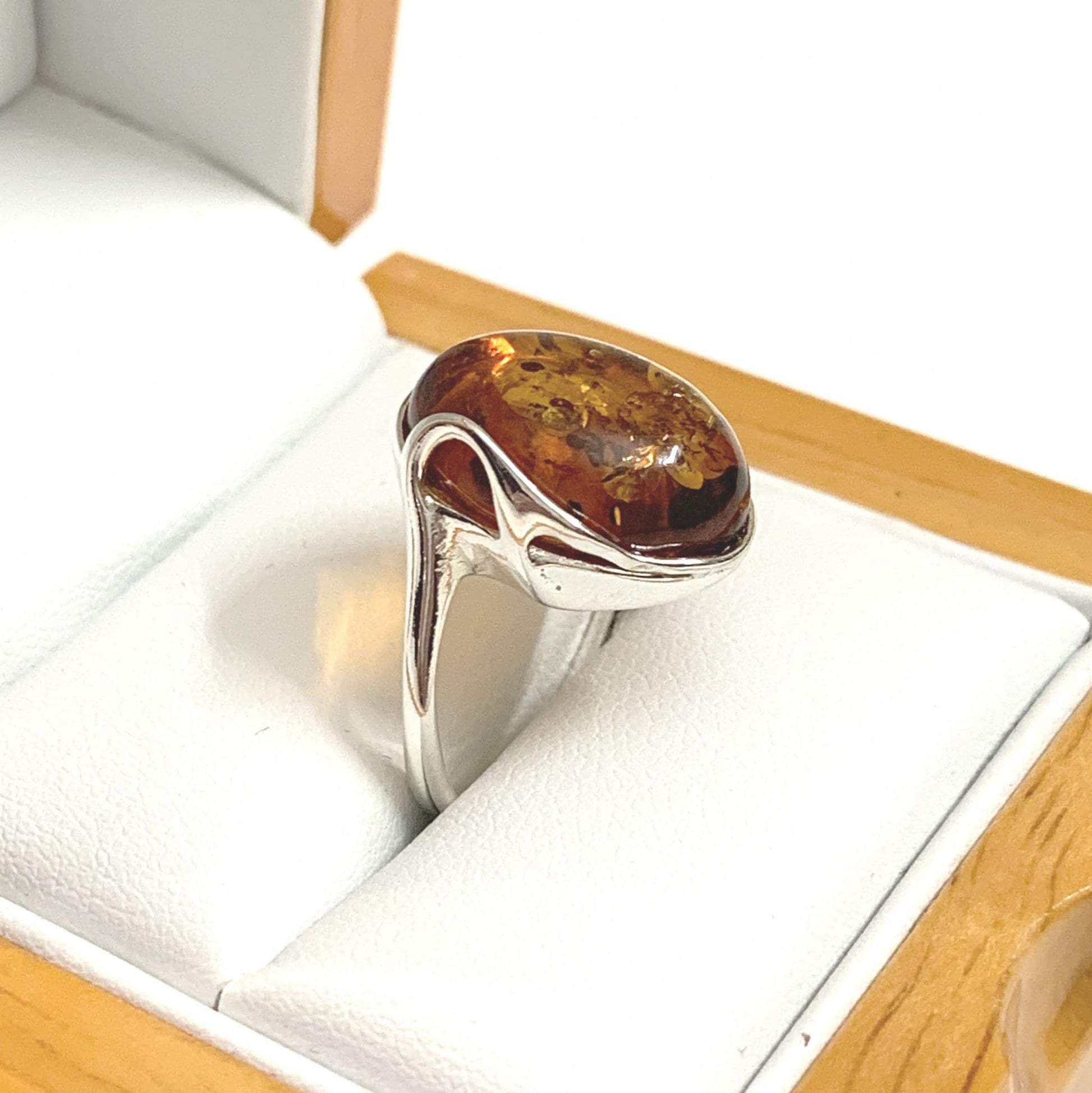 Large Oval Twisted Sterling Silver Orange Amber Ring