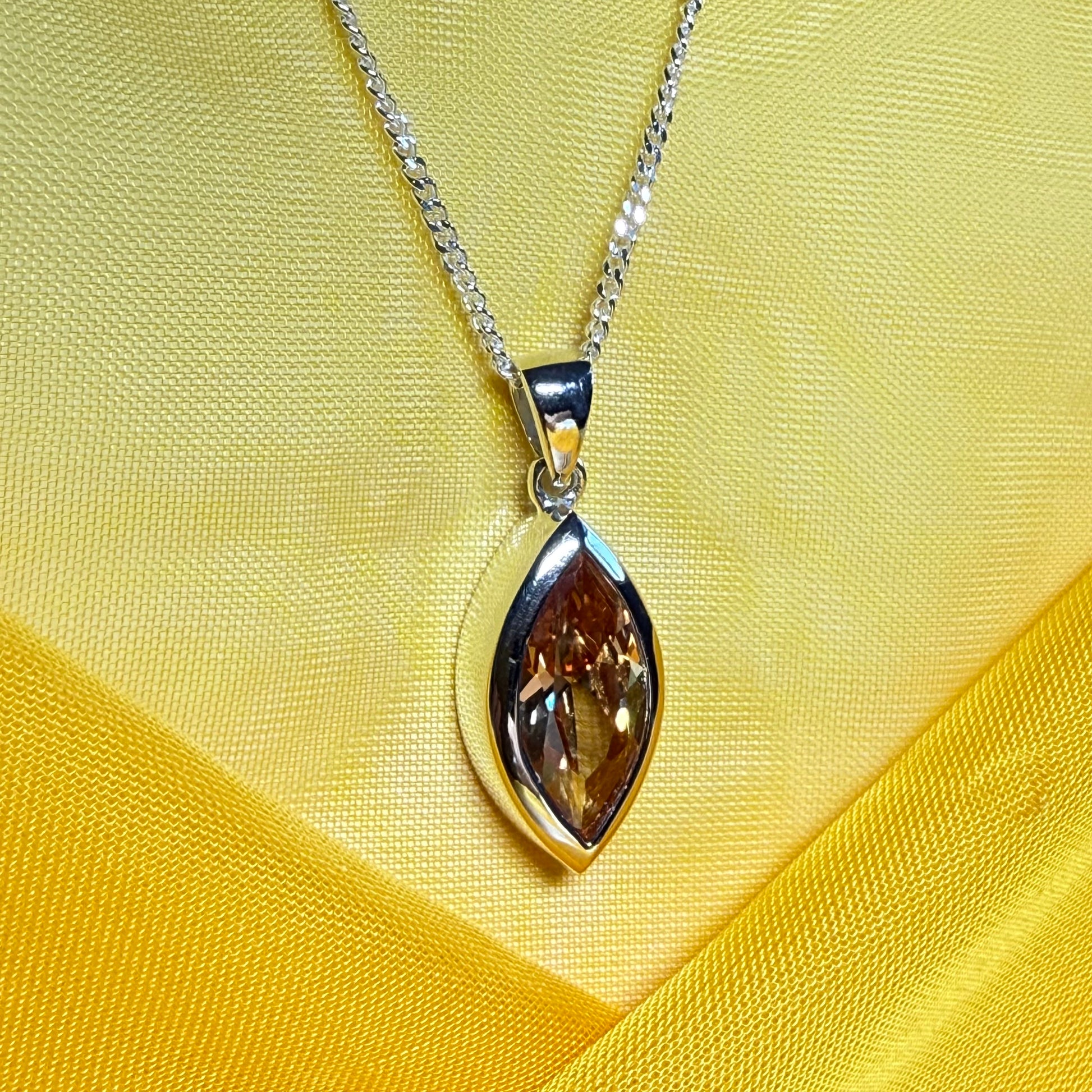 Large citrine coloured cubcic zirconia necklace pendant marquise smooth rub over setting with chain