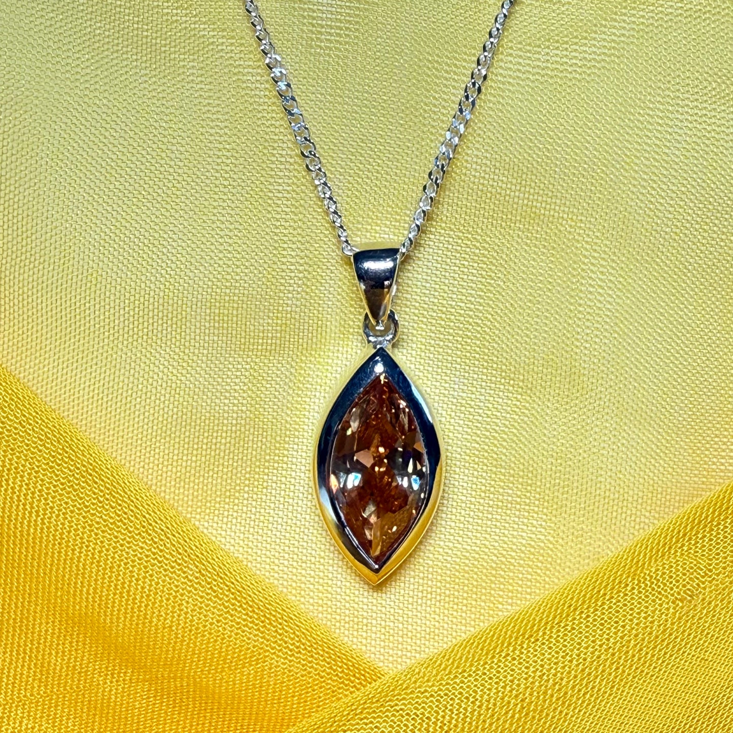 Large citrine coloured cubic zirconia necklace pendant marquise smooth rub over setting with chain