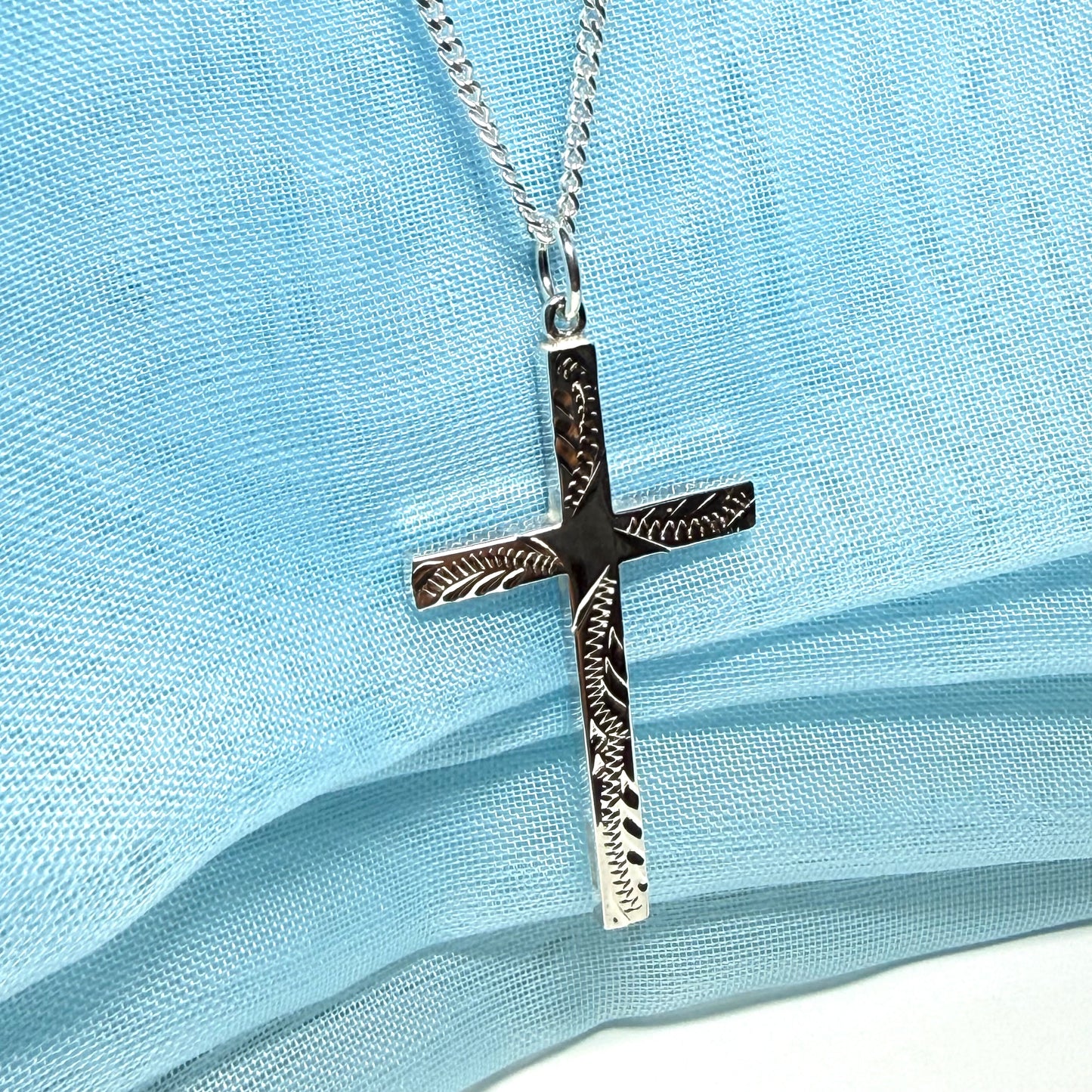 Large cross sterling silver with a patterned designed