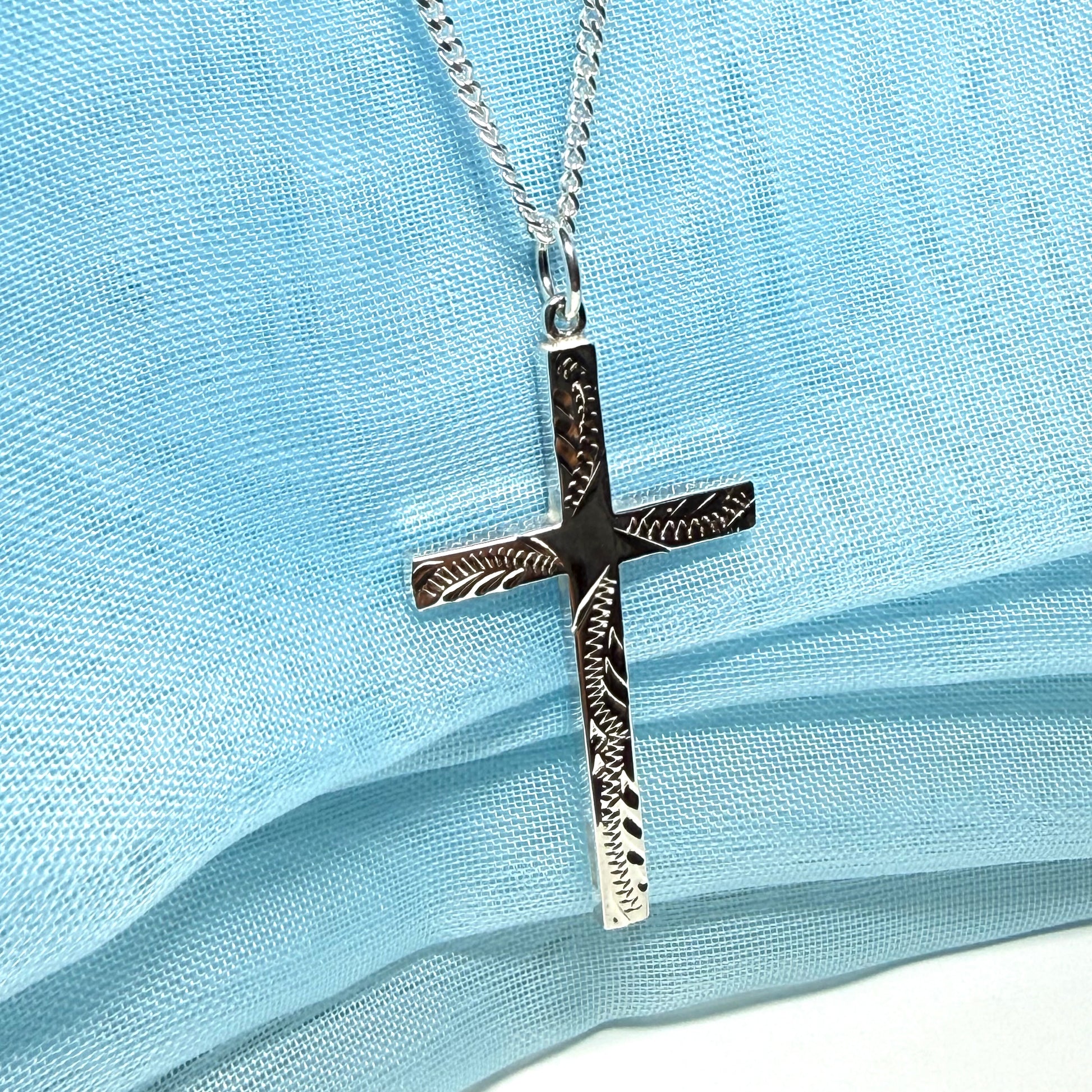 Large cross sterling silver with a patterned designed