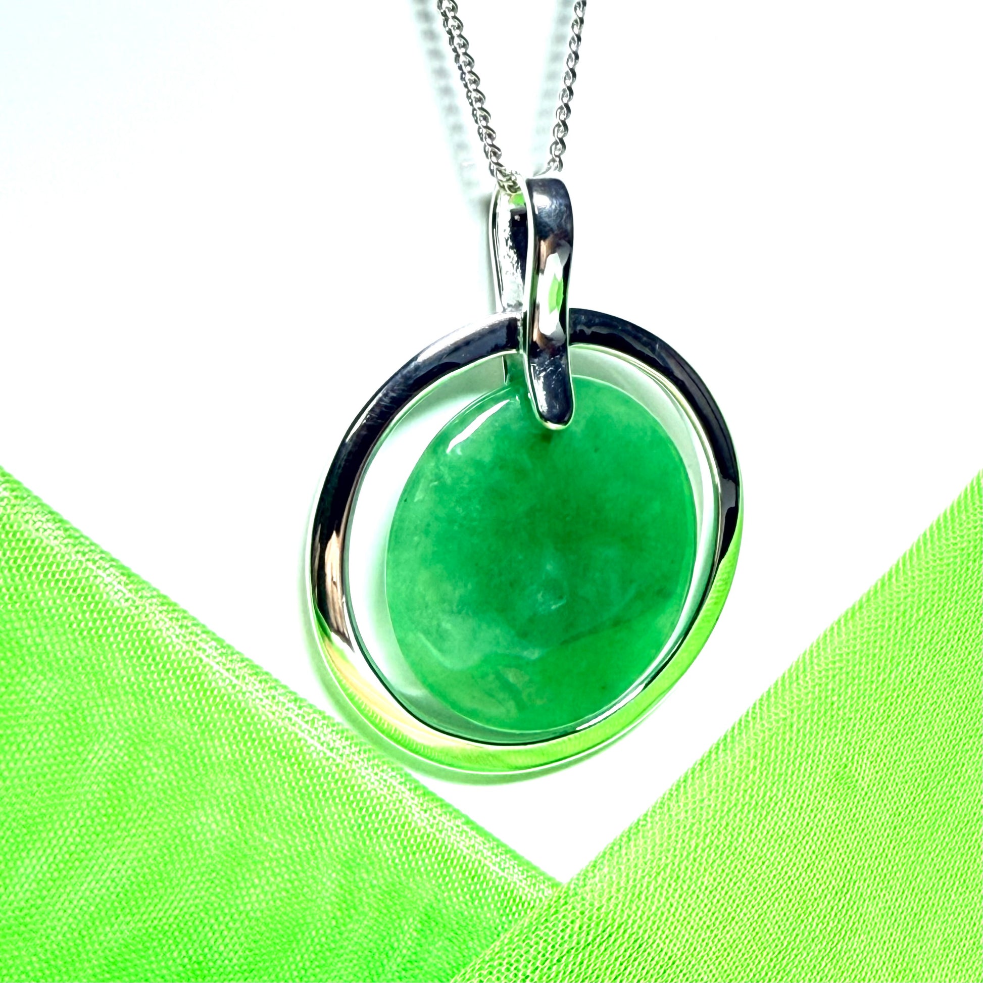 Large necklace sterling silver round shaped green real jade halo styled pendant curb with a chain included