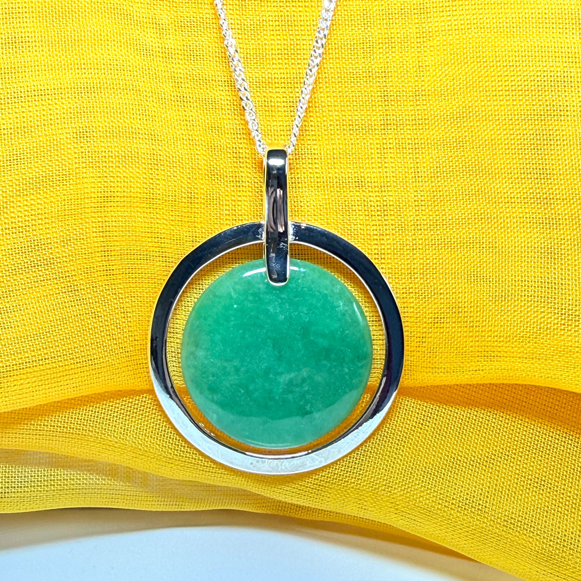 Large necklace sterling silver round shaped green real jade halo styled pendant curb with a chain included as well
