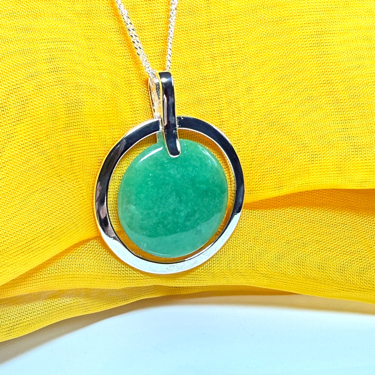 Large necklace sterling silver round shaped green real jade halo styled pendant curb with a chain included as well