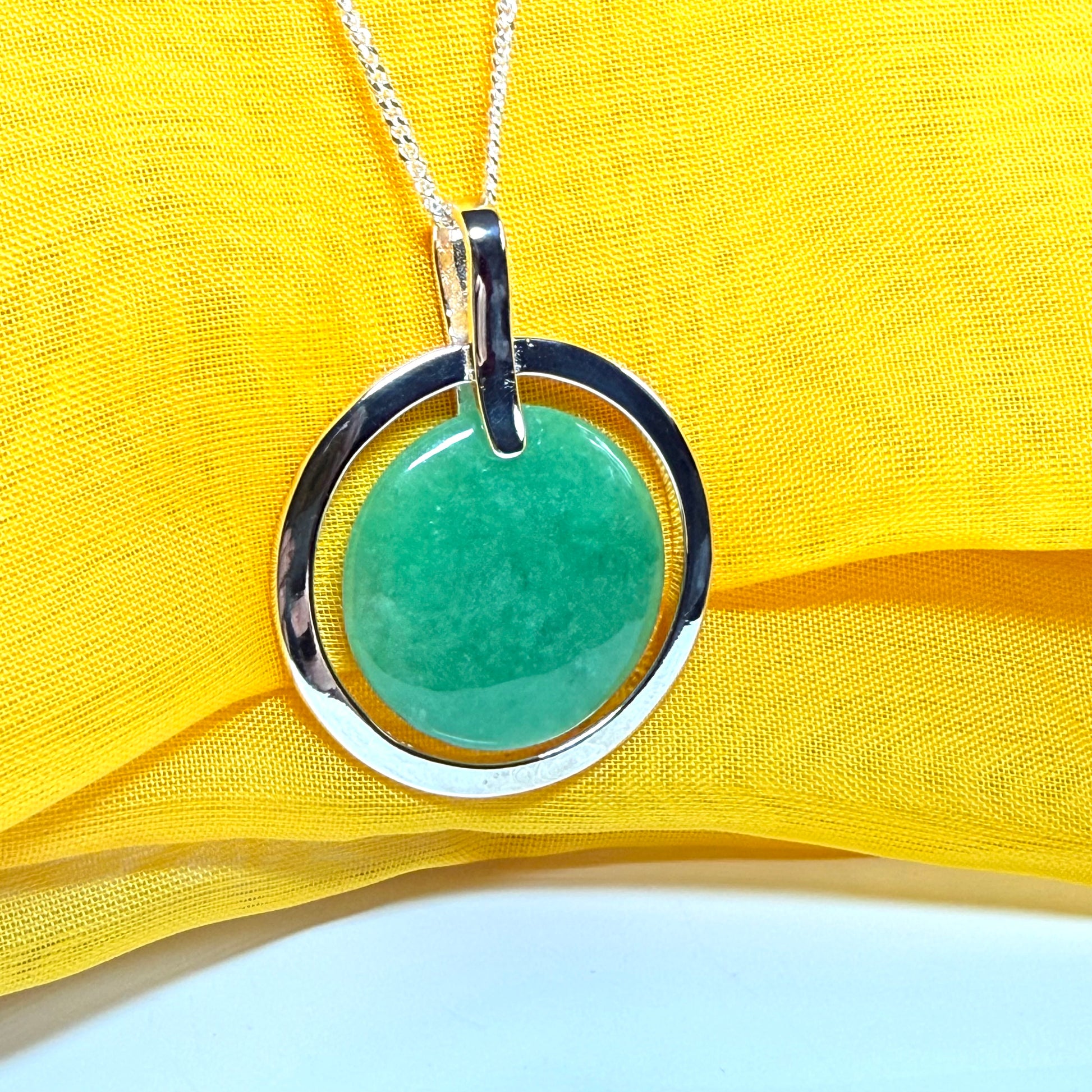 Large necklace sterling silver round shaped green real jade halo styled pendant curb with a chain included as well