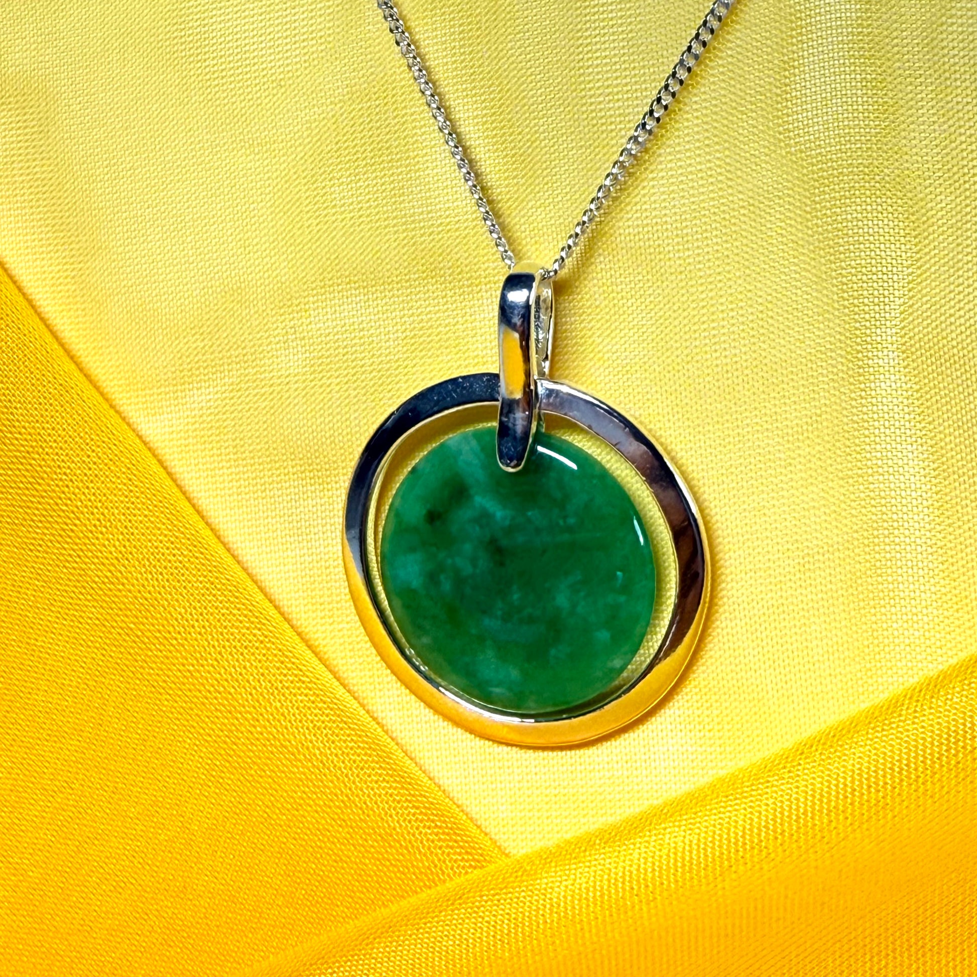 Large silver round shaped dark green real jade pendant necklace with a chain