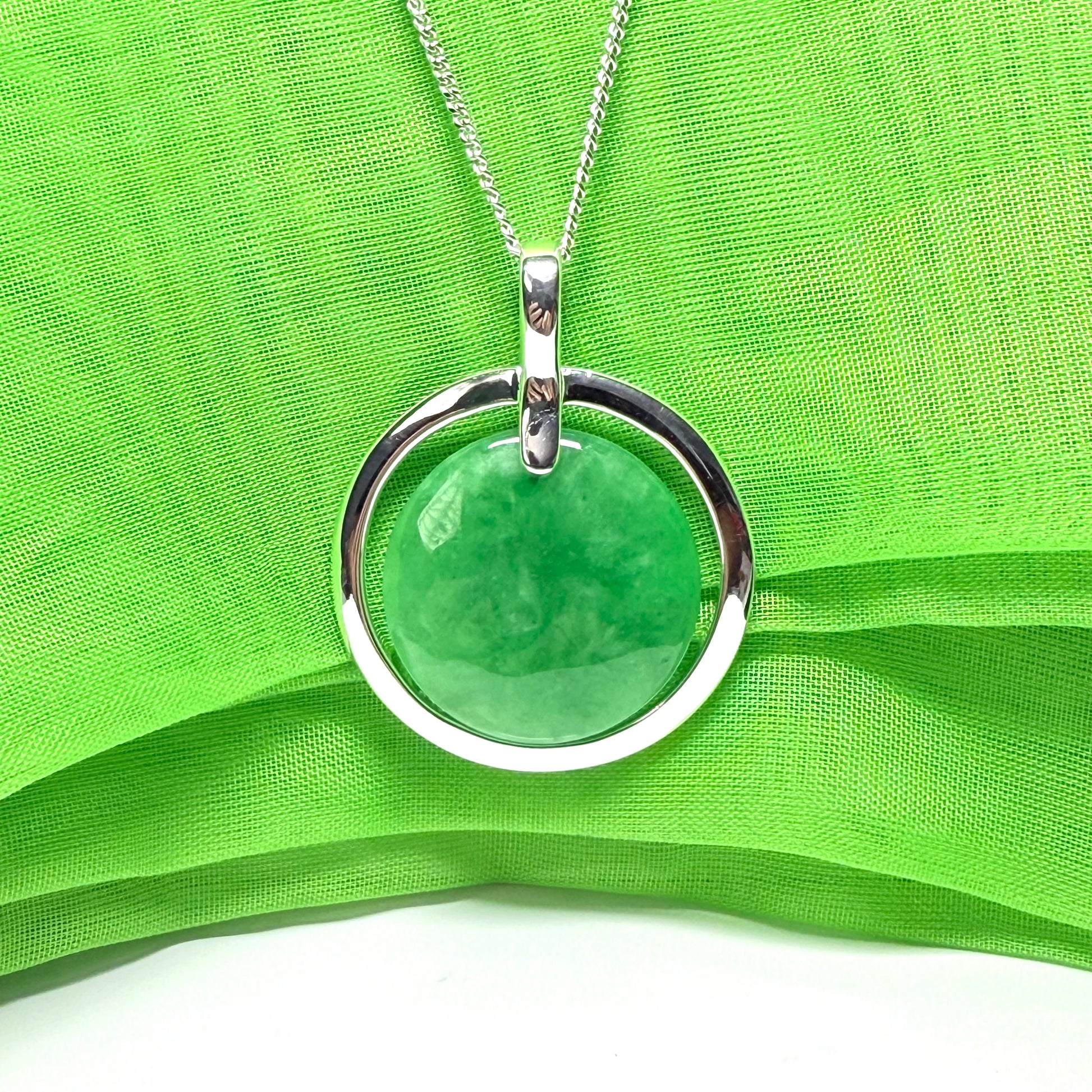 Large necklace sterling silver round shaped green real jade halo styled pendant curb with a chain included
