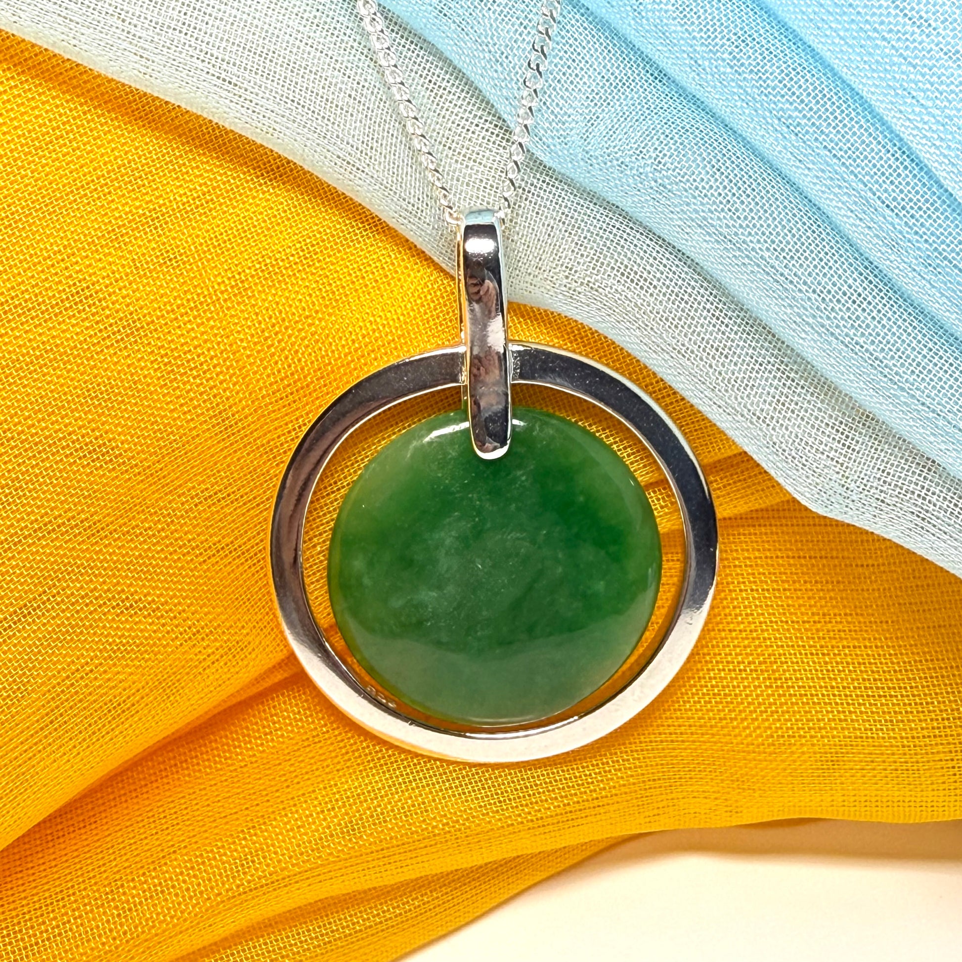 Large sterling silver round shaped green real jade necklace halo style, a stunning and timeless pendant design