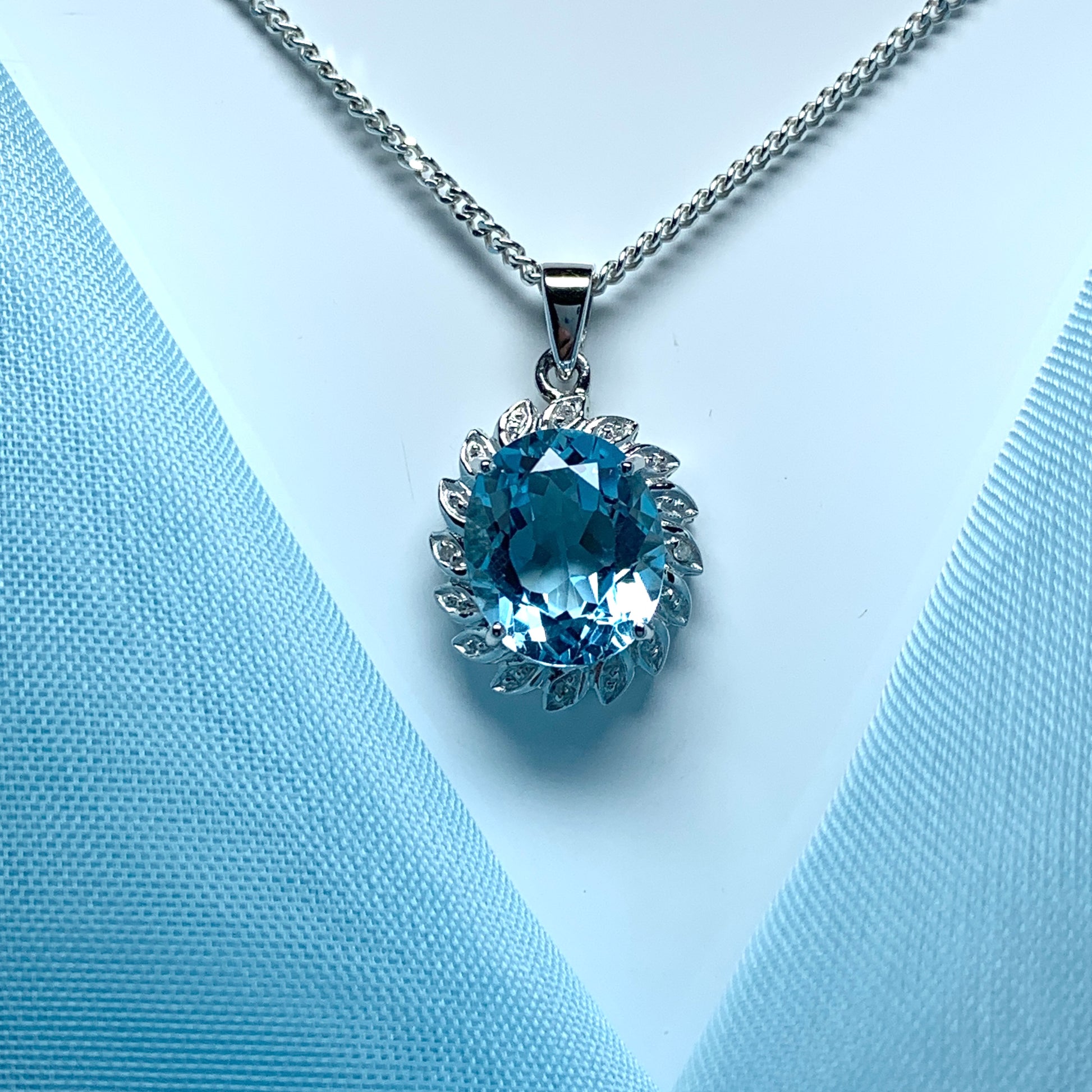 Large blue topaz and diamond sterling silver necklace