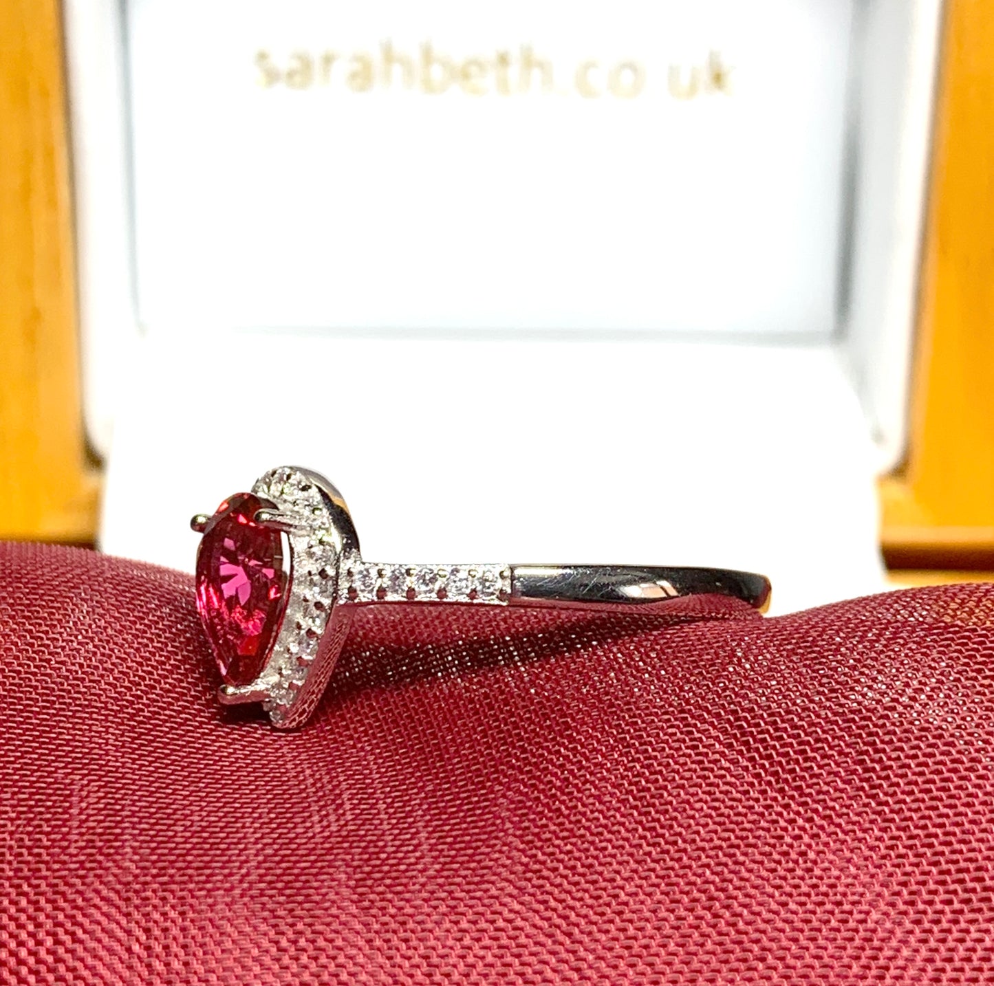 Large bright red and white cubic zirconia pear shaped cluster dress cocktail ring