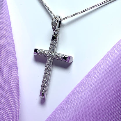 Large cubic zirconia set fancy sterling silver cross