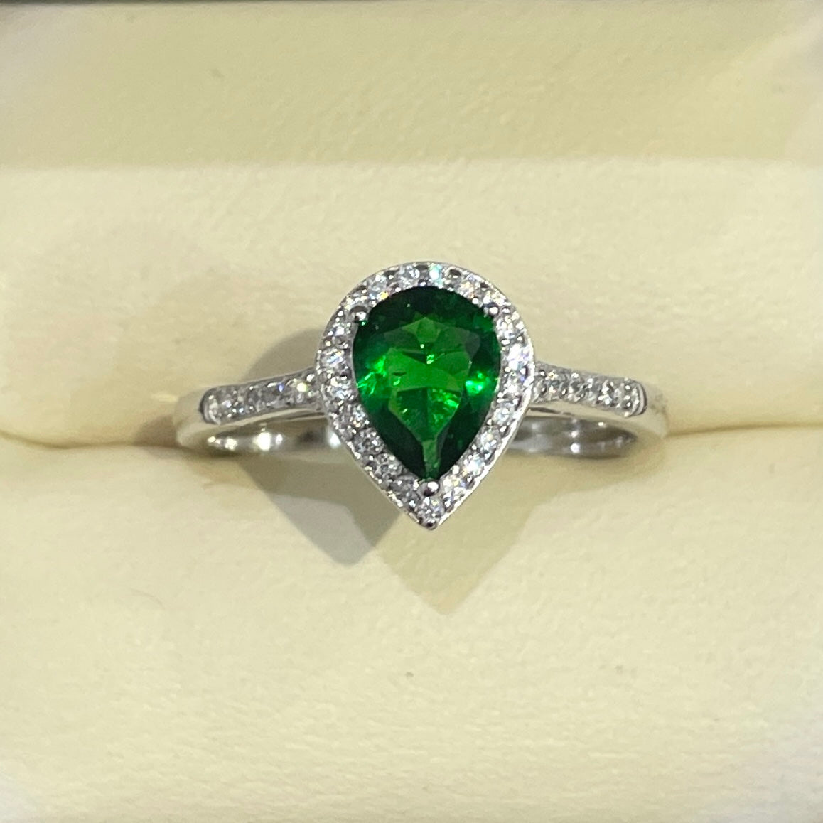 Large deep bright emerald and white cubic zirconia oval cluster dress cocktail ring