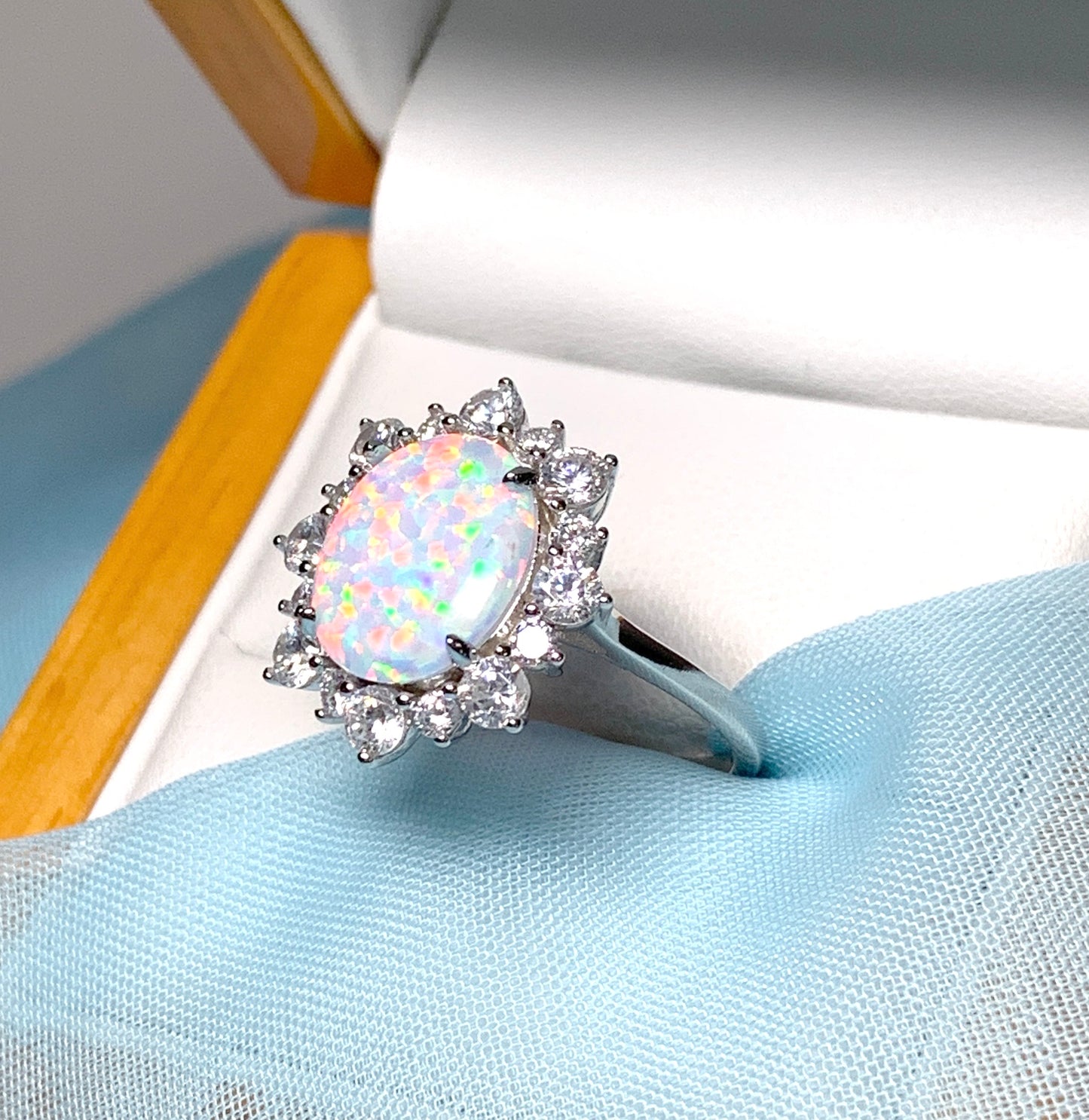 Opal cluster ring oval sterling silver and cubic zirconia