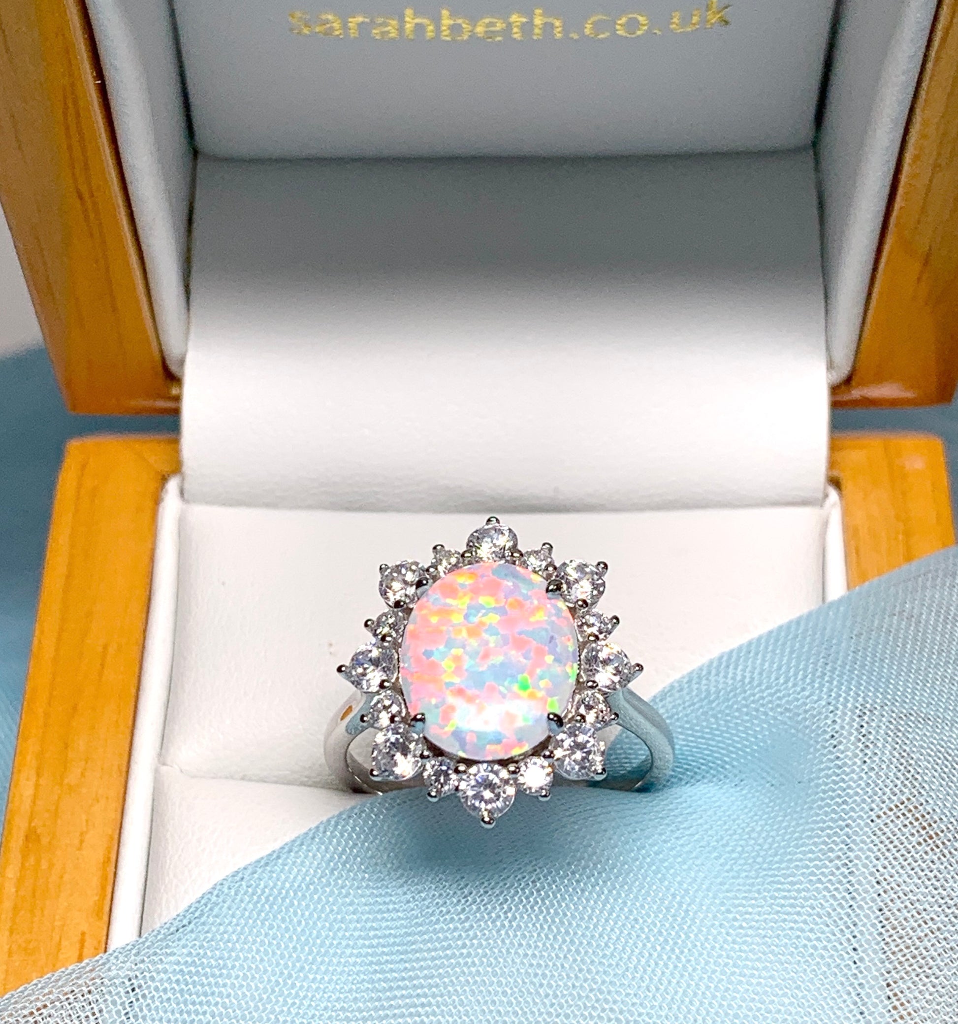 Opal cluster ring oval sterling silver and cubic zirconia