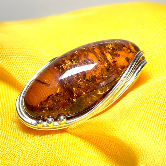 Large oval amber necklace and brooch