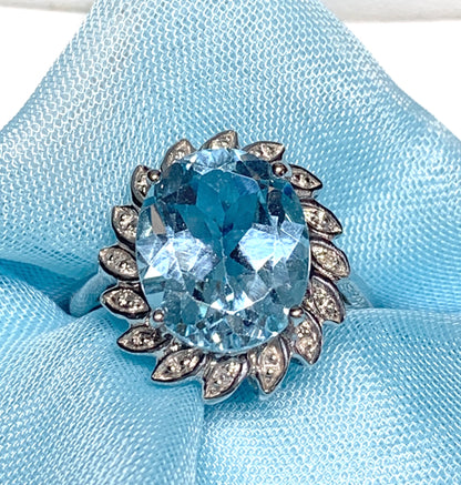 Large oval blue topaz and diamond sterling silver cluster ring