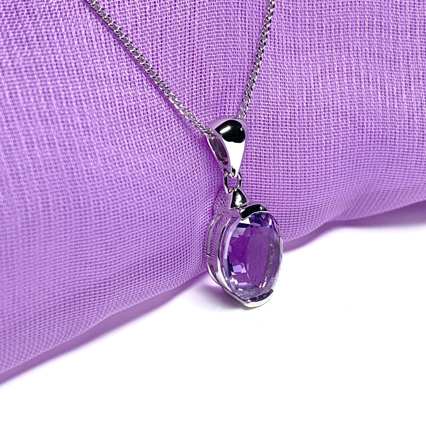 Large oval shaped purple amethyst white gold necklace