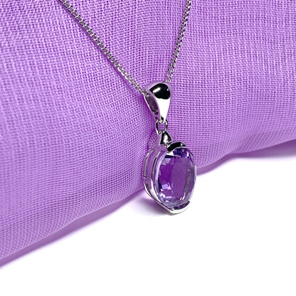 Large oval shaped purple amethyst white gold necklace