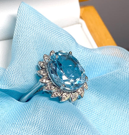 Large oval blue topaz and diamond sterling silver cluster ring